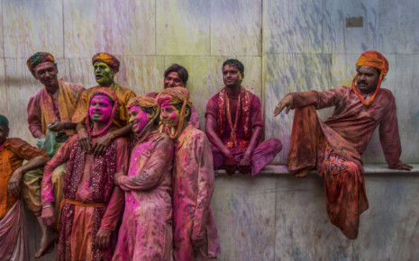Hindu men rest during Lathmaar Holi celebrations on March 22, 2013 in the village of Nundgaon near Mathura, India.(Daniel Berehulak/Getty Images)